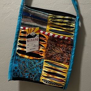 Boho Crossbody purse in Blue trim NWT Adjustable strap. From Naples Boutique